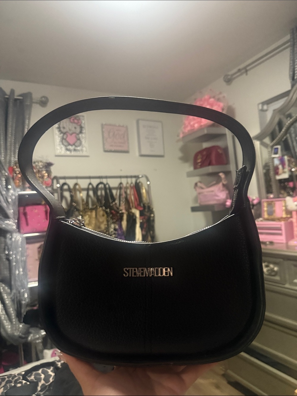 Black Steve Madden Pebbled Leather Shoulder Bag with silver detailing on bottom